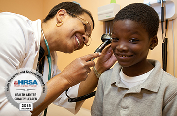 Dr. Noella Clark seeing a patient